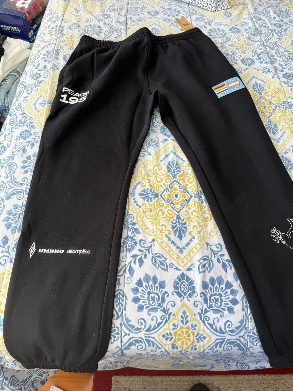 Umbro Men’s Black Sweatpants with Rainbow Patch
